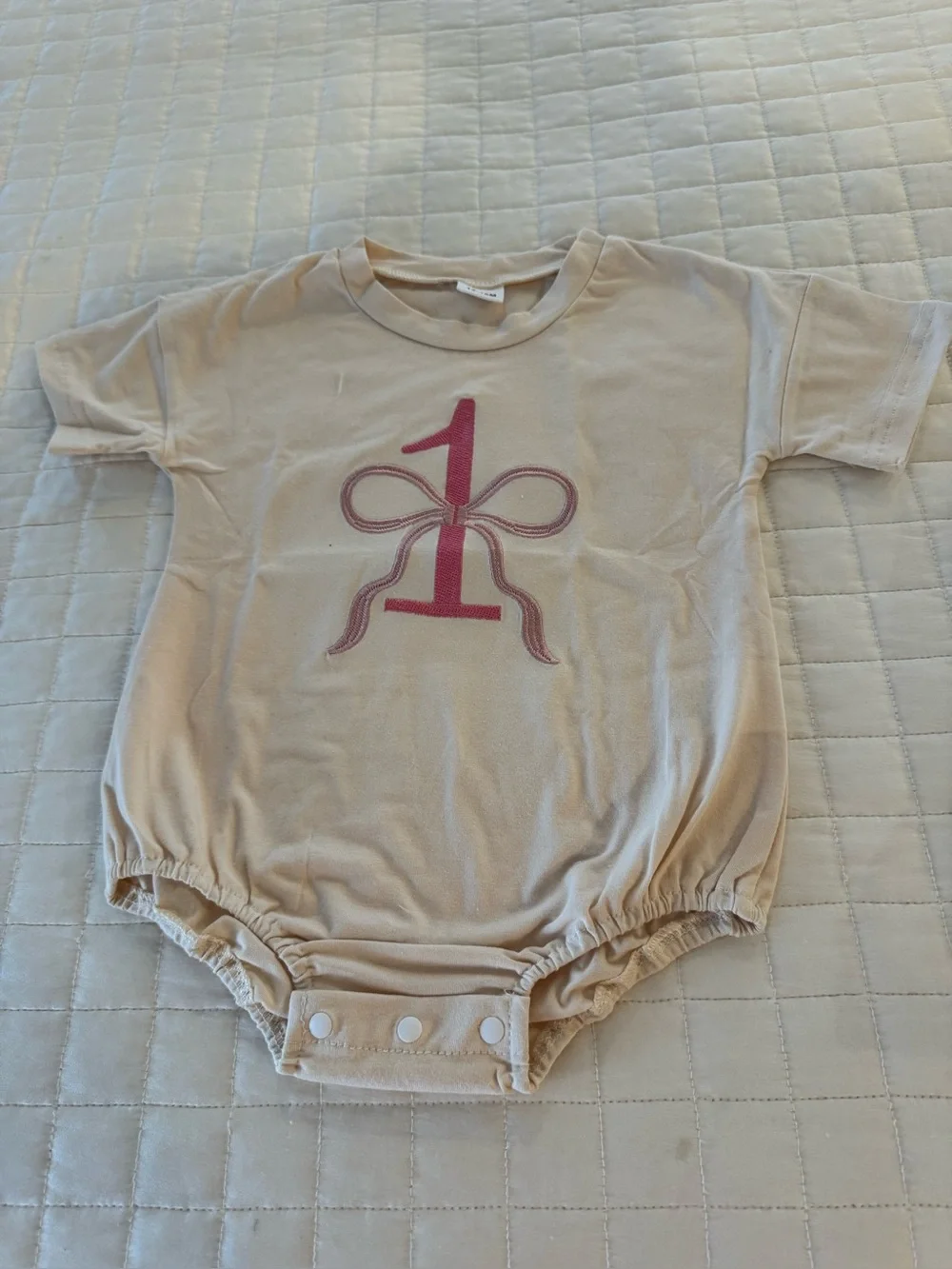 Beige One-Piece Baby Romper with Pink Number Graphic Happy Birthday 